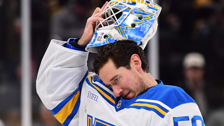 Dec 4, 2025; Boston, Massachusetts, USA; St. Louis Blues goaltender Jordan Binnington (50) slips on his goalie mask during the third period against the Boston Bruins at TD Garden. Mandatory Credit: Bob DeChiara-Imagn Images Dec 4, 2025; Boston, Massachusetts, USA; St. Louis Blues goaltender Jordan Binnington (50) slips on his goalie mask during the third period against the Boston Bruins at TD Garden. Mandatory Credit: Bob DeChiara-Imagn Images