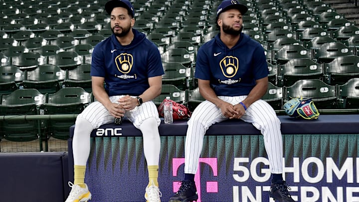 Oct 2, 2024; Milwaukee, Wisconsin, USA; Milwaukee Brewers pitcher Joel Payamps (31), left and outfielder Jackson Chourio (11) before game two of the Wildcard round for the 2024 MLB Playoffs against the New York Mets at American Family Field. Mandatory Credit: Benny Sieu-Imagn Images