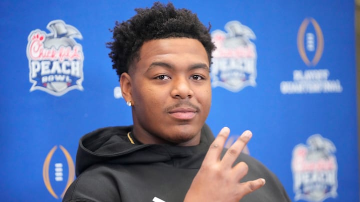 Arizona State defensive lineman C.J. Fite gives the forks up sign during media day for the Chick-fil-A Peach Bowl in Atlanta on Monday, Dec. 30, 2024.
