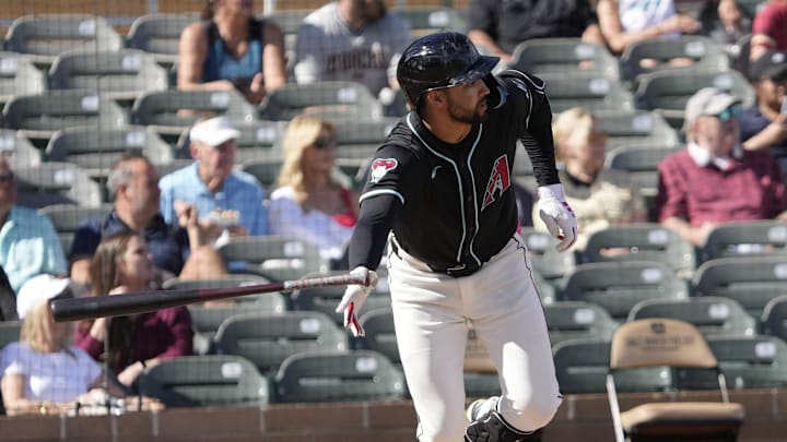 Arizona Diamondbacks shortstop Jordan Lawlar (10) tosses his bat while batting against the Cleveland Guardians during a spring training game at Salt River Fields on Feb. 24, 2025. Arizona Diamondbacks shortstop Jordan Lawlar (10) tosses his bat while batting against the Cleveland Guardians during a spring training game at Salt River Fields on Feb. 24, 2025.