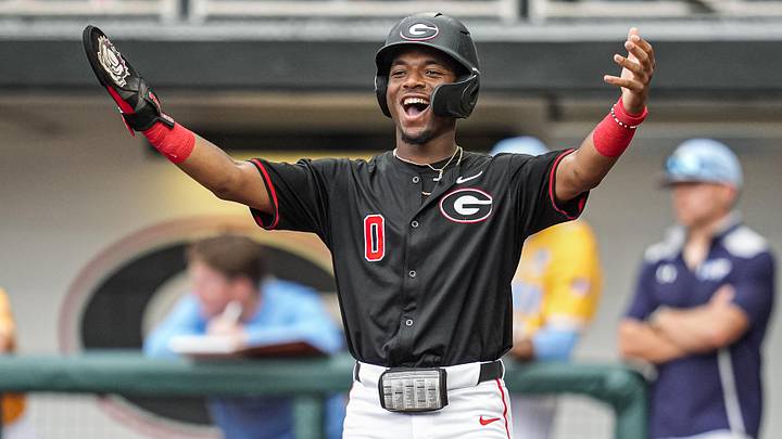 May 29, 2026; Athens, GA, USA; Georgia Bulldogs infielder Ryan Wynn (0) reacts with catcher Jack Arcamone (7) (not shown) after Arcamone hit a home run against the LIU Sharks at Foley Field. Mandatory Credit: Dale Zanine-Imagn Images