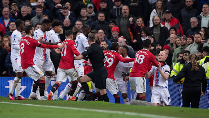 Casemiro was dismissed for grabbing Will Hughes' throat