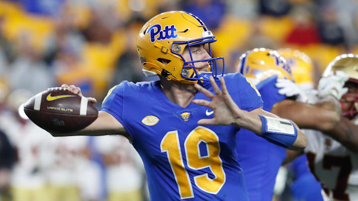 Nov 16, 2023; Pittsburgh, Pennsylvania, USA;  Pittsburgh Panthers quarterback Nate Yarnell (19) passes against the Boston College Eagles during the third quarter at Acrisure Stadium. Mandatory Credit: Charles LeClaire-Imagn Images