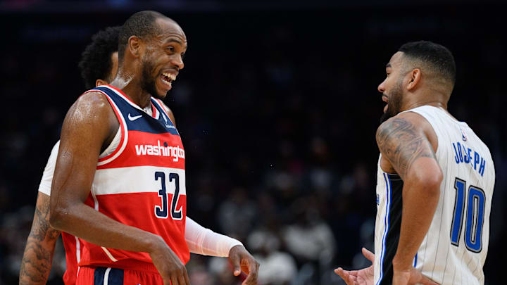 Mar 21, 2025; Washington, District of Columbia, USA; Washington Wizards forward Khris Middleton (32) and Orlando Magic guard Cory Joseph (10) react during the fourth quarter at Capital One Arena. Mandatory Credit: Reggie Hildred-Imagn Images