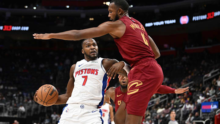 Oct 16, 2024; Detroit, Michigan, USA; Detroit Pistons forward Paul Reed (7) drives to the basket against Cleveland Cavaliers forward Evan Mobley (4) in the third quarter at Little Caesars Arena. Mandatory Credit: Lon Horwedel-Imagn Images