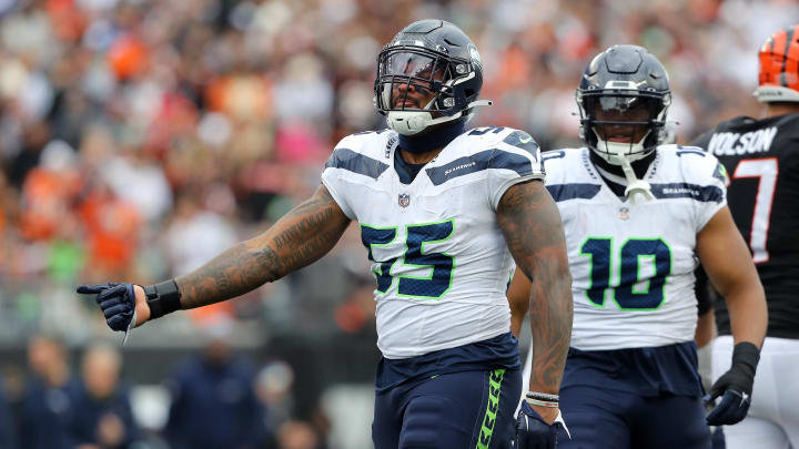 Oct 15, 2023; Cincinnati, Ohio, USA; Seattle Seahawks defensive end Dre'Mont Jones (55) celebrates the sack during the third quarter against the Cincinnati Bengals at Paycor Stadium. Oct 15, 2023; Cincinnati, Ohio, USA; Seattle Seahawks defensive end Dre'Mont Jones (55) celebrates the sack during the third quarter against the Cincinnati Bengals at Paycor Stadium.