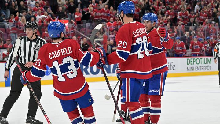 Oct 6, 2026; Montreal, Quebec, CAN; Montreal Canadiens forward Juraj Slafkovsky (20) celebrates with teammates forward Cole Caufield (13) and forward Nick Suzuki (14) after scoring a goal against the Carolina Hurricanes during the third period at the Bell Centre. Mandatory Credit: Eric Bolte-Imagn Images Oct 6, 2026; Montreal, Quebec, CAN; Montreal Canadiens forward Juraj Slafkovsky (20) celebrates with teammates forward Cole Caufield (13) and forward Nick Suzuki (14) after scoring a goal against the Carolina Hurricanes during the third period at the Bell Centre. Mandatory Credit: Eric Bolte-Imagn Images