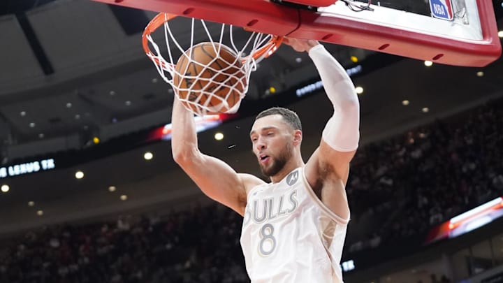 Jan 25, 2025; Chicago, Illinois, USA; Chicago Bulls guard Zach LaVine (8) dunks the ball against the Philadelphia 76ers during the first quarter at United Center. Mandatory Credit: David Banks-Imagn Images