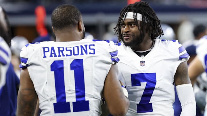 Dallas Cowboys linebacker Micah Parsons and cornerback Trevon Diggs laugh during a game against the Philadelphia Eagles.