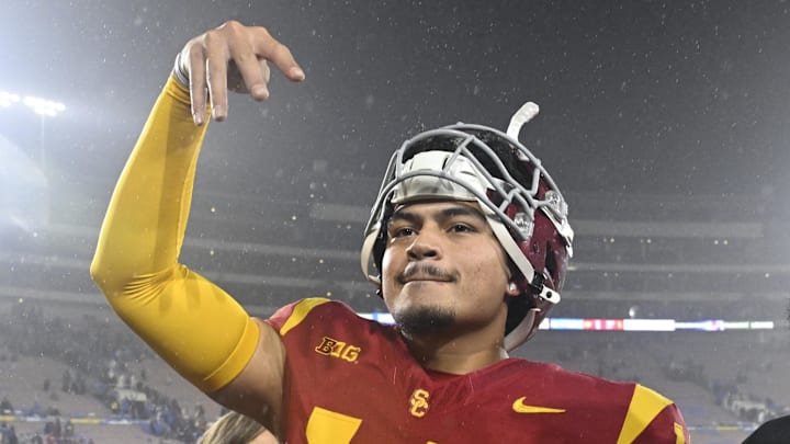 Nov 23, 2024; Pasadena, California, USA;  USC Trojans quarterback Jayden Maiava (14) celebrates the win over UCLA at Rose Bowl. 