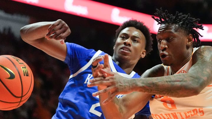 Kentucky's Jaxson Robinson (2) and Tennessee's Darlinstone Dubar (8) battle for the rebound during an NCAA college basketball game on Tuesday, Jan. 28, 2025, in Knoxville, Tenn.