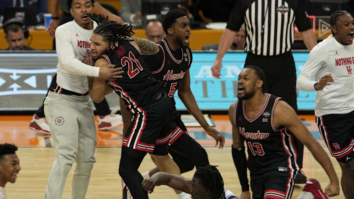 Apr 5, 2025; San Antonio, TX, USA; Houston Cougars guard Emanuel Sharp (21) reacts after defeating the Duke Blue Devils in the semifinals of the men's Final Four of the 2025 NCAA Tournament at Alamodome. Mandatory Credit: Scott Wachter-Imagn Images
