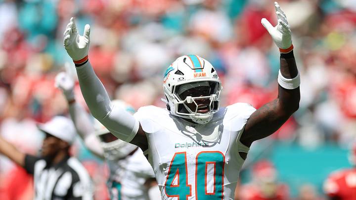  Miami Dolphins linebacker Willie Gay Jr. (40) reacts after a stop on fourth down against the Kansas City Chiefs at Hard Rock Stadium.  