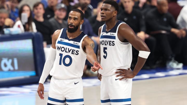 May 28, 2024; Dallas, Texas, USA; Minnesota Timberwolves guard Anthony Edwards (5) and guard Mike Conley (10) speak during the second quarter against the Dallas Mavericks in game four of the western conference finals for the 2024 NBA playoffs at American Airlines Center. Mandatory Credit: Kevin Jairaj-USA TODAY Sports