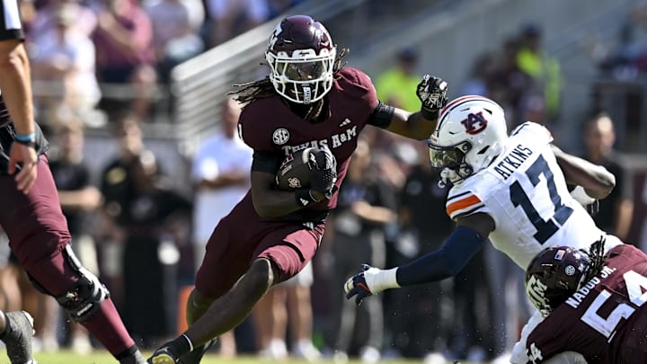 Sep 27, 2025; College Station, Texas, USA; Texas A&M Aggies wide receiver Mario Craver (1) runs the ball against the Auburn Tigers during the first half at Kyle Field. Mandatory Credit: Maria Lysaker-Imagn Images 