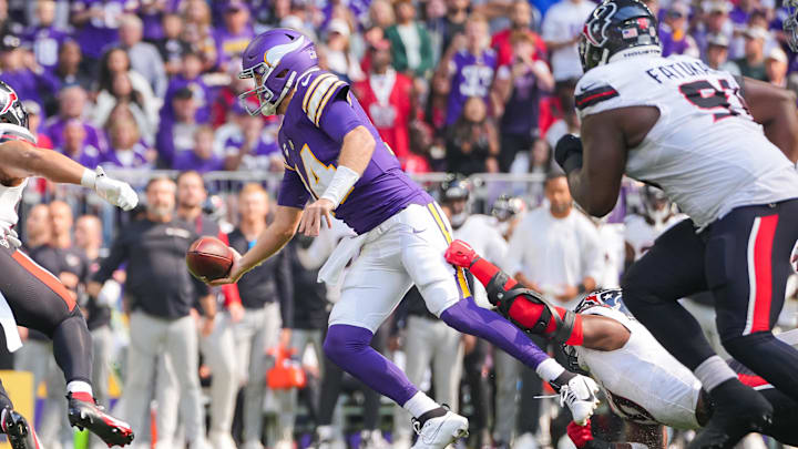 Sep 22, 2024; Minneapolis, Minnesota, USA; Minnesota Vikings quarterback Sam Darnold (14) passes against the Houston Texans in the first quarter at U.S. Bank Stadium. Mandatory Credit: Brad Rempel-Imagn Images Sep 22, 2024; Minneapolis, Minnesota, USA; Minnesota Vikings quarterback Sam Darnold (14) passes against the Houston Texans in the first quarter at U.S. Bank Stadium. Mandatory Credit: Brad Rempel-Imagn Images