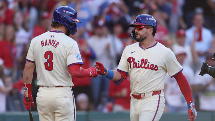 Oct 5, 2024; Philadelphia, PA, USA; Philadelphia Phillies designated hitter Kyle Schwarber (12) celebrates with Bryce Harper (3) after hitting a solo home run against the New York Mets in the first inning in game one of the NLDS for the 2024 MLB Playoffs at Citizens Bank Park. Mandatory Credit: Bill Streicher-Imagn Images Oct 5, 2024; Philadelphia, PA, USA; Philadelphia Phillies designated hitter Kyle Schwarber (12) celebrates with Bryce Harper (3) after hitting a solo home run against the New York Mets in the first inning in game one of the NLDS for the 2024 MLB Playoffs at Citizens Bank Park. Mandatory Credit: Bill Streicher-Imagn Images