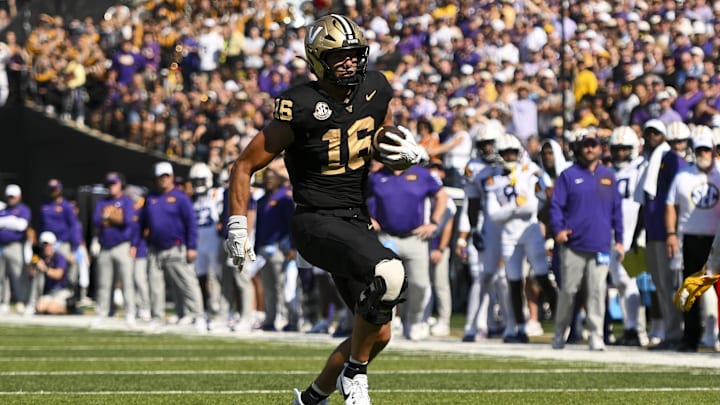 Oct 18, 2025; Nashville, Tennessee, USA;  Vanderbilt Commodores tight end Cole Spence (16) runs with the ball after a made catch against the Louisiana State Tigers during the first half at FirstBank Stadium. Mandatory Credit: Steve Roberts-Imagn Images