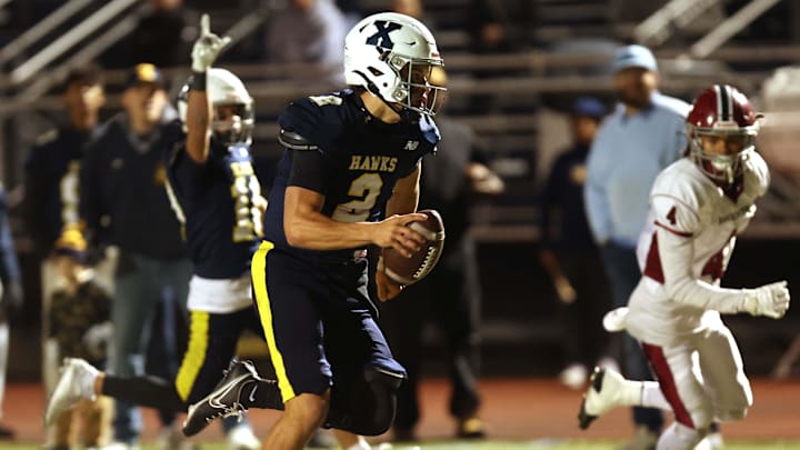 Xaverian Brothers High quarterback Will Wood scores a touchdown during a Massachusetts Division I game against Brockton. 