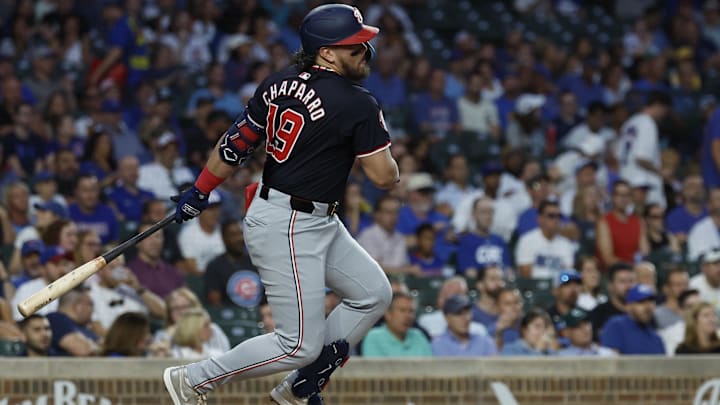 Washington Nationals third baseman Andres Chaparro hits an RBI single against the Chicago Cubs during the first inning. Washington Nationals third baseman Andres Chaparro hits an RBI single against the Chicago Cubs during the first inning.