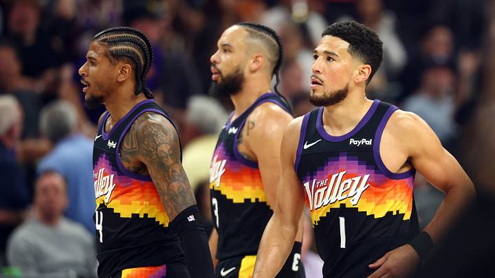 Apr 7, 2026; Phoenix, Arizona, USA; Phoenix Suns guard Jalen Green (4), forward Dillon Brooks (3) and guard Devin Booker (1) against the Houston Rockets at Mortgage Matchup Center. Mandatory Credit: Mark J. Rebilas-Imagn Images Apr 7, 2026; Phoenix, Arizona, USA; Phoenix Suns guard Jalen Green (4), forward Dillon Brooks (3) and guard Devin Booker (1) against the Houston Rockets at Mortgage Matchup Center. Mandatory Credit: Mark J. Rebilas-Imagn Images
