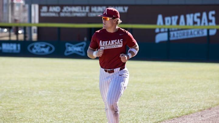 Feb 6, 2026; Fayetteville, AR, USA; Arkansas Razorbacks infielder Camden Kozeal (8) warms up before the start of the Arkansas Razorbacks scrimmage at Baum-Walker Stadium. Mandatory Credit: Brett Rojo-Imagn Images Feb 6, 2026; Fayetteville, AR, USA; Arkansas Razorbacks infielder Camden Kozeal (8) warms up before the start of the Arkansas Razorbacks scrimmage at Baum-Walker Stadium. Mandatory Credit: Brett Rojo-Imagn Images