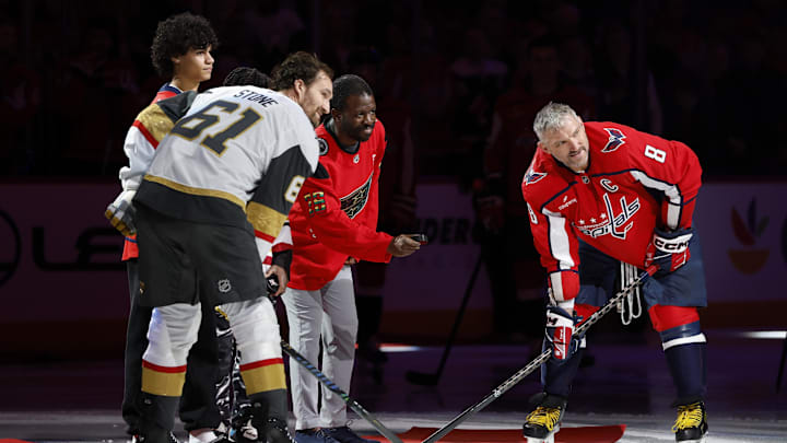 Mark Stone and Alex Ovechkin line up for the Celebrating Black History Month Night commemorative faceoff.