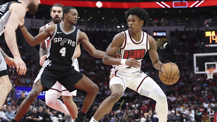 Feb 26, 2025; Houston, Texas, USA; Houston Rockets forward Amen Thompson (1) controls the ball as San Antonio Spurs guard De'Aaron Fox (4) defends during the third quarter at Toyota Center. Mandatory Credit: Troy Taormina-Imagn Images Feb 26, 2025; Houston, Texas, USA; Houston Rockets forward Amen Thompson (1) controls the ball as San Antonio Spurs guard De'Aaron Fox (4) defends during the third quarter at Toyota Center. Mandatory Credit: Troy Taormina-Imagn Images