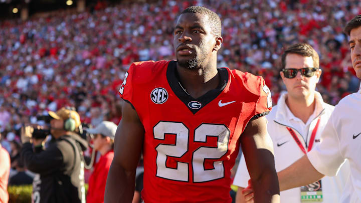 Oct 12, 2024; Athens, Georgia, USA; Georgia Bulldogs running back Branson Robinson (22) leaves with an injury against the Mississippi State Bulldogs in the second quarter at Sanford Stadium. Mandatory Credit: Brett Davis-Imagn Images
Oct 12, 2024; Athens, Georgia, USA; Georgia Bulldogs running back Branson Robinson (22) leaves with an injury against the Mississippi State Bulldogs in the second quarter at Sanford Stadium. Mandatory Credit: Brett Davis-Imagn Images