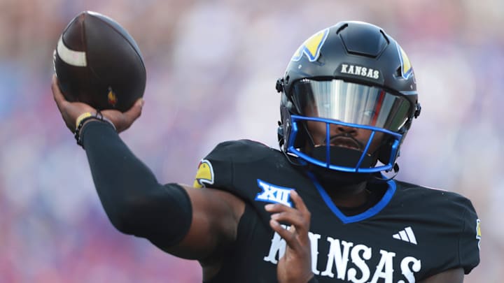 Kansas Jayhawks quarterback Jalon Daniels (6) throws a pass during the first half of the game against West Virginia Mountaineers at David Booth Kansas Memorial Stadium on Sept. 20, 2025.