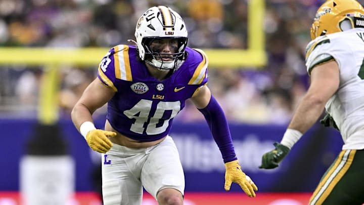 Dec 31, 2024; Houston, TX, USA; LSU Tigers linebacker Whit Weeks (40) defends in coverage against the Baylor Bears during the first half at NRG Stadium. The Tigers defeat the Bears 44-31. Mandatory Credit: Maria Lysaker-Imagn Images 