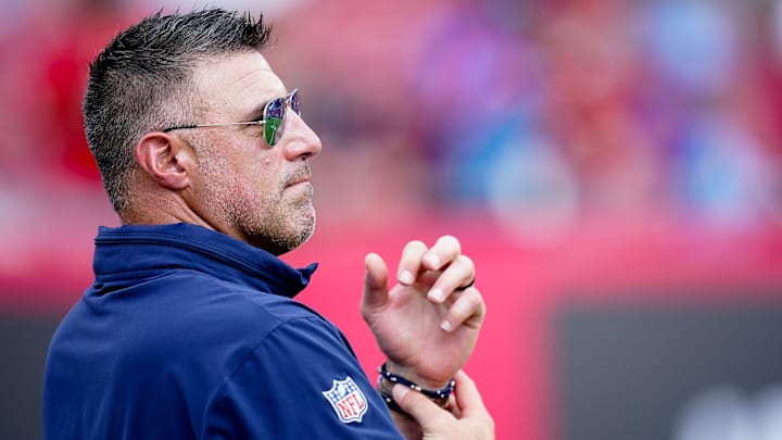 Tennessee Titans head coach Mike Vrabel watches his team warm up before a game against the Tampa Bay Buccaneers at Raymond James Stadium in Tampa, Fla., Sunday, Nov. 12, 2023.