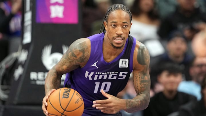 Dec 8, 2024; Sacramento, California, USA; Sacramento Kings forward DeMar DeRozan (10) dribbles against the Utah Jazz during the second quarter at Golden 1 Center. Mandatory Credit: Darren Yamashita-Imagn Images