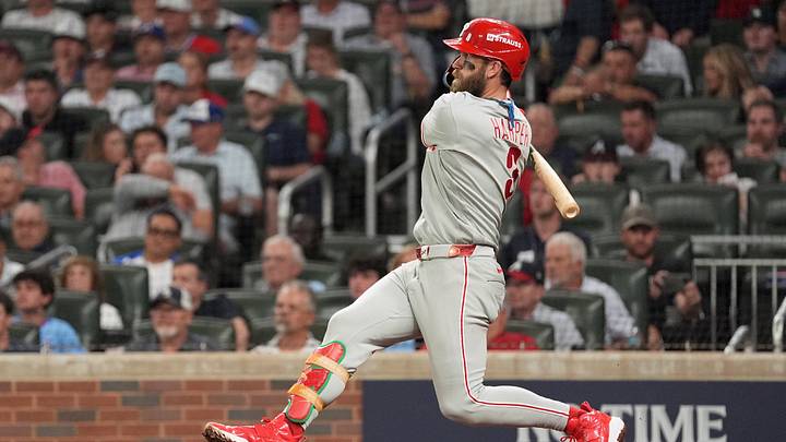 Oct 1, 2026; Cumberland, Georgia, USA;  Philadelphia Phillies infielder Bryce Harper (3) hits a double to right field against Atlanta Braves pitcher Robert Suarez (not pictured) during the sixth inning in game three of the Wildcard round for the 2026 MLB Playoffs at Truist Field.  Mandatory Credit: Dale Zanine-Imagn Images