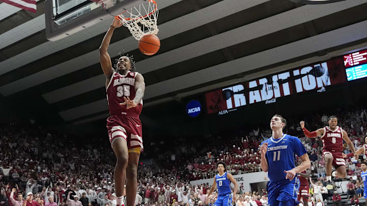 Dec 14, 2024; Tuscaloosa, Alabama, USA; Alabama forward Derrion Reid (35) gets a breakaway dunk with Creighton center Ryan Kalkbrenner (11) too far behind to defend the dunk at Coleman Coliseum. Alabama defeated Creighton 83-75. Mandatory Credit: Gary Cosby Jr.-Imagn Images Dec 14, 2024; Tuscaloosa, Alabama, USA; Alabama forward Derrion Reid (35) gets a breakaway dunk with Creighton center Ryan Kalkbrenner (11) too far behind to defend the dunk at Coleman Coliseum. Alabama defeated Creighton 83-75. Mandatory Credit: Gary Cosby Jr.-Imagn Images