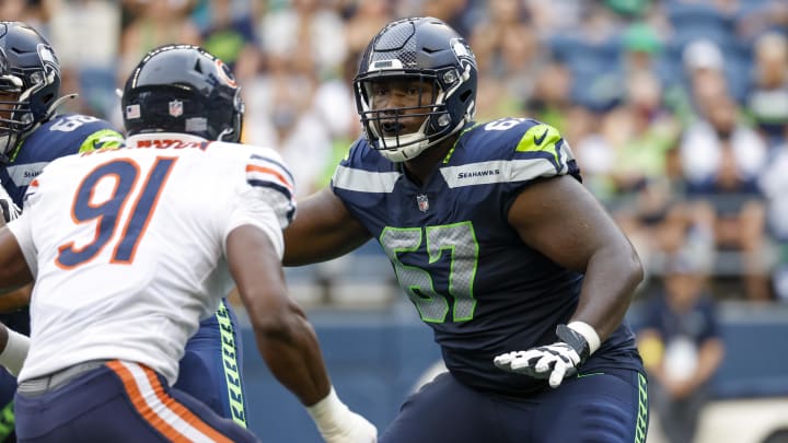 Aug 18, 2022; Seattle, Washington, USA; Seattle Seahawks offensive tackle Charles Cross (67) blocks against the Chicago Bears during the second quarter at Lumen Field.
