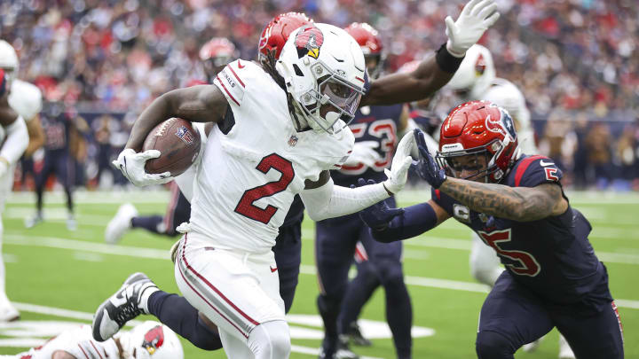 Nov 19, 2023; Houston, Texas, USA; Arizona Cardinals wide receiver Marquise Brown (2) runs with the ball as Houston Texans safety Jalen Pitre (5) attempts to make a tackle during the second quarter at NRG Stadium. Mandatory Credit: Troy Taormina-USA TODAY Sports Nov 19, 2023; Houston, Texas, USA; Arizona Cardinals wide receiver Marquise Brown (2) runs with the ball as Houston Texans safety Jalen Pitre (5) attempts to make a tackle during the second quarter at NRG Stadium. Mandatory Credit: Troy Taormina-USA TODAY Sports