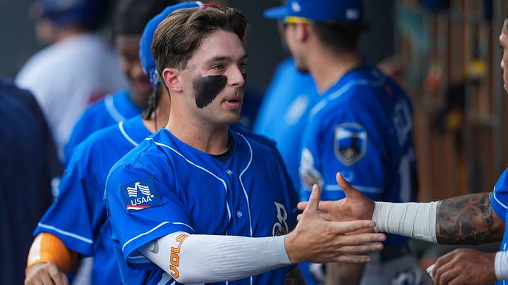 Biloxi Shuckers infielder Andrew Fischer (25) high-fives teammates after bringing in a run during a minor league baseball game between the Knoxville Smokies and Biloxi Shuckers at Covenant Health Park in Knoxville, Tenn., on July 7, 2026.