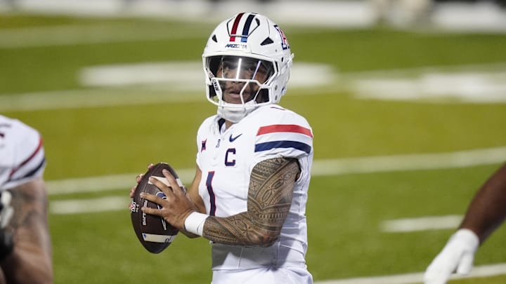 Nov 1, 2025; Boulder, Colorado, USA; Arizona Wildcats quarterback Noah Fifita (1) prepares to pass the ball in second quarter against the Colorado Buffaloes at Folsom Field. Mandatory Credit: Ron Chenoy-Imagn Images
