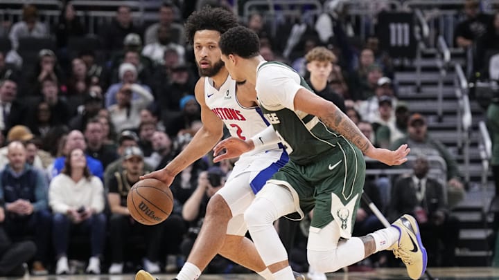 Dec 3, 2025; Milwaukee, Wisconsin, USA; Detroit Pistons guard Cade Cunningham (2) brings the ball up the court against Milwaukee Bucks guard Ryan Rollins (13) in the second half at Fiserv Forum. Mandatory Credit: Michael McLoone-Imagn Images Dec 3, 2025; Milwaukee, Wisconsin, USA; Detroit Pistons guard Cade Cunningham (2) brings the ball up the court against Milwaukee Bucks guard Ryan Rollins (13) in the second half at Fiserv Forum. Mandatory Credit: Michael McLoone-Imagn Images