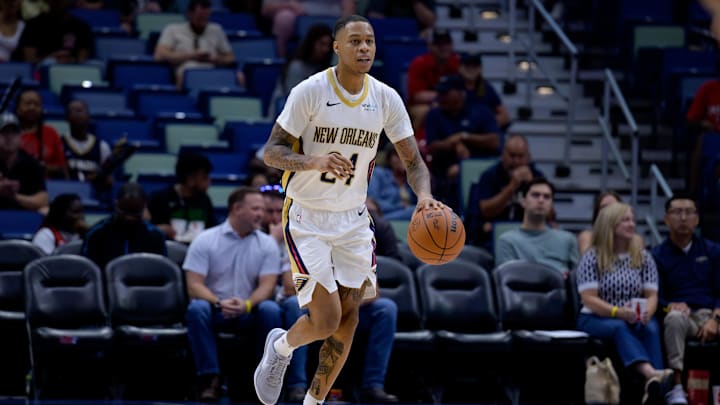 Oct 7, 2024; New Orleans, Louisiana, USA; New Orleans Pelicans guard Jordan Hawkins (24) dribbles against the Orlando Magic at Smoothie King Center. 