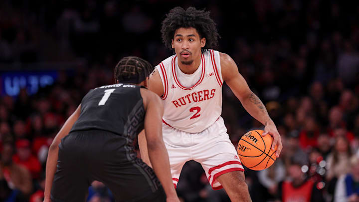 Jan 25, 2025; New York, New York, USA; Rutgers Scarlet Knights guard Dylan Harper (2) dribbles as Michigan State Spartans guard Jeremy Fears Jr. (1) defends during the first half at Madison Square Garden. Mandatory Credit: Vincent Carchietta-Imagn Images Jan 25, 2025; New York, New York, USA; Rutgers Scarlet Knights guard Dylan Harper (2) dribbles as Michigan State Spartans guard Jeremy Fears Jr. (1) defends during the first half at Madison Square Garden. Mandatory Credit: Vincent Carchietta-Imagn Images