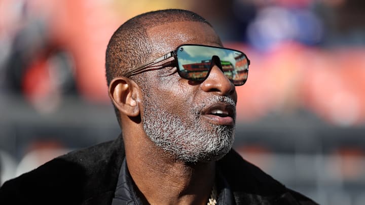 Dec 21, 2025; Cleveland, Ohio, USA;  Legendary  football and baseball player and father of Cleveland Browns quarterback Shedeur Sanders, Deion Sanders on the sidelines prior to a game against the Buffalo Bills at Huntington Bank Field. Mandatory Credit: Scott Galvin-Imagn Images