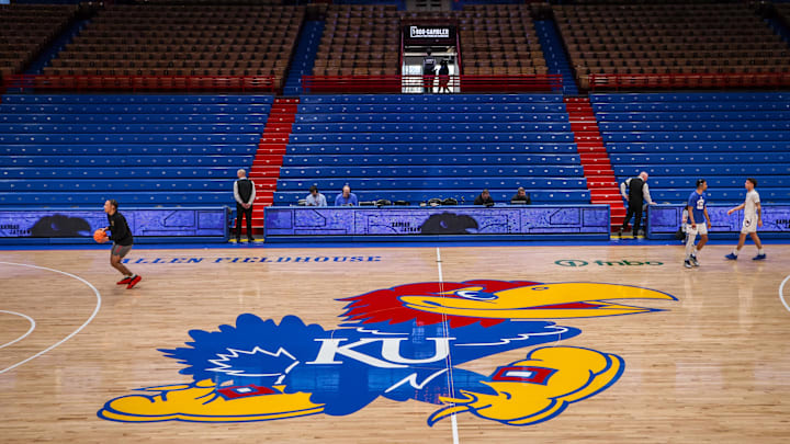 Mar 1, 2025; Lawrence, Kansas, USA; Kansas Jayhawks logo at center court prior to the game against the Texas Tech Red Raiders at Allen Fieldhouse. 