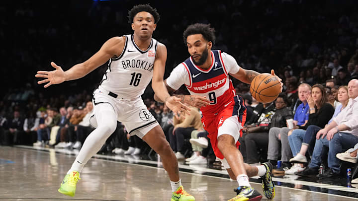 Oct 14, 2024; Brooklyn, New York, USA; Washington Wizards small forward Justin Champagnie (9) dribbles the ball against Brooklyn Nets guard Jaylen Martin (16) during the second half at Barclays Center. Mandatory Credit: Gregory Fisher-Imagn Images Oct 14, 2024; Brooklyn, New York, USA; Washington Wizards small forward Justin Champagnie (9) dribbles the ball against Brooklyn Nets guard Jaylen Martin (16) during the second half at Barclays Center. Mandatory Credit: Gregory Fisher-Imagn Images