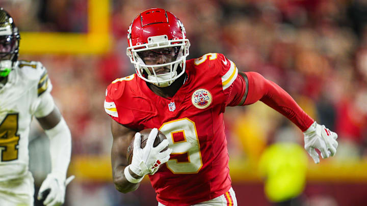 Oct 7, 2024; Kansas City, Missouri, USA; Kansas City Chiefs wide receiver JuJu Smith-Schuster (9) runs with the ball during the first half against the New Orleans Saints at GEHA Field at Arrowhead Stadium. Mandatory Credit: Jay Biggerstaff-Imagn Images