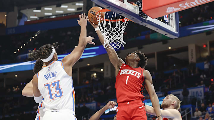 Oct 9, 2024; Oklahoma City, Oklahoma, USA;Houston Rockets forward Amen Thompson (1) shoots against the Oklahoma City Thunder during the second half at Paycom Center. Mandatory Credit: Alonzo Adams-Imagn Images