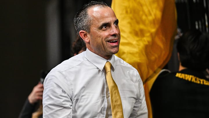 Iowa Hawkeyes head coach Ben McCollum