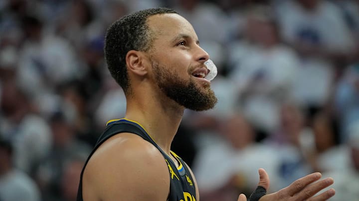 May 6, 2025; Minneapolis, Minnesota, USA; Golden State Warriors guard Stephen Curry (30) prepares to play the Minnesota Timberwolves before game one of the second round for the 2025 NBA Playoffs at Target Center. Mandatory Credit: Bruce Kluckhohn-Imagn Images