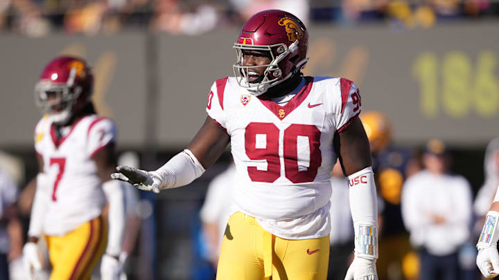 Oct 28, 2023; Berkeley, California, USA; USC Trojans defensive lineman Bear Alexander (90) gestures during the third quarter against the California Golden Bears at California Memorial Stadium. Mandatory Credit: Darren Yamashita-Imagn Images